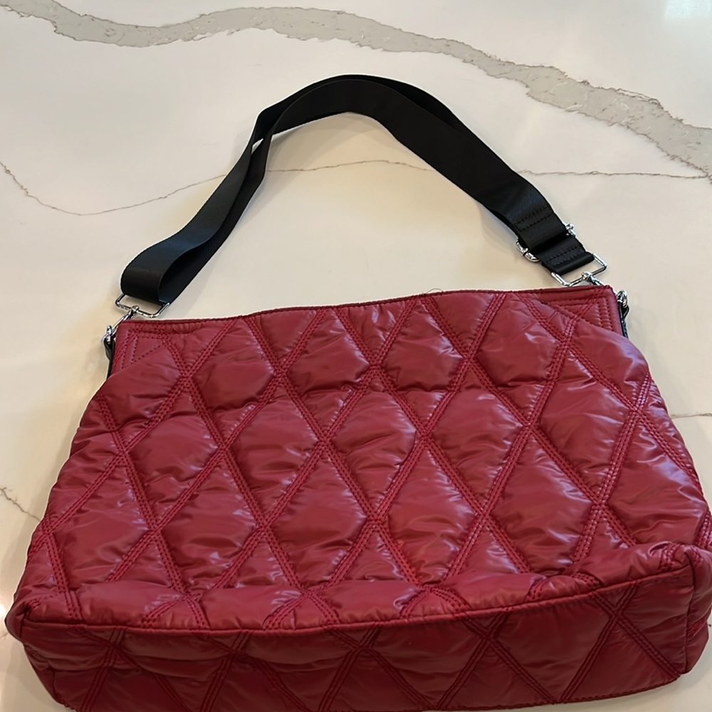 Nylon quilted raspberry colored Tote Bag. Great size long adjustable straps